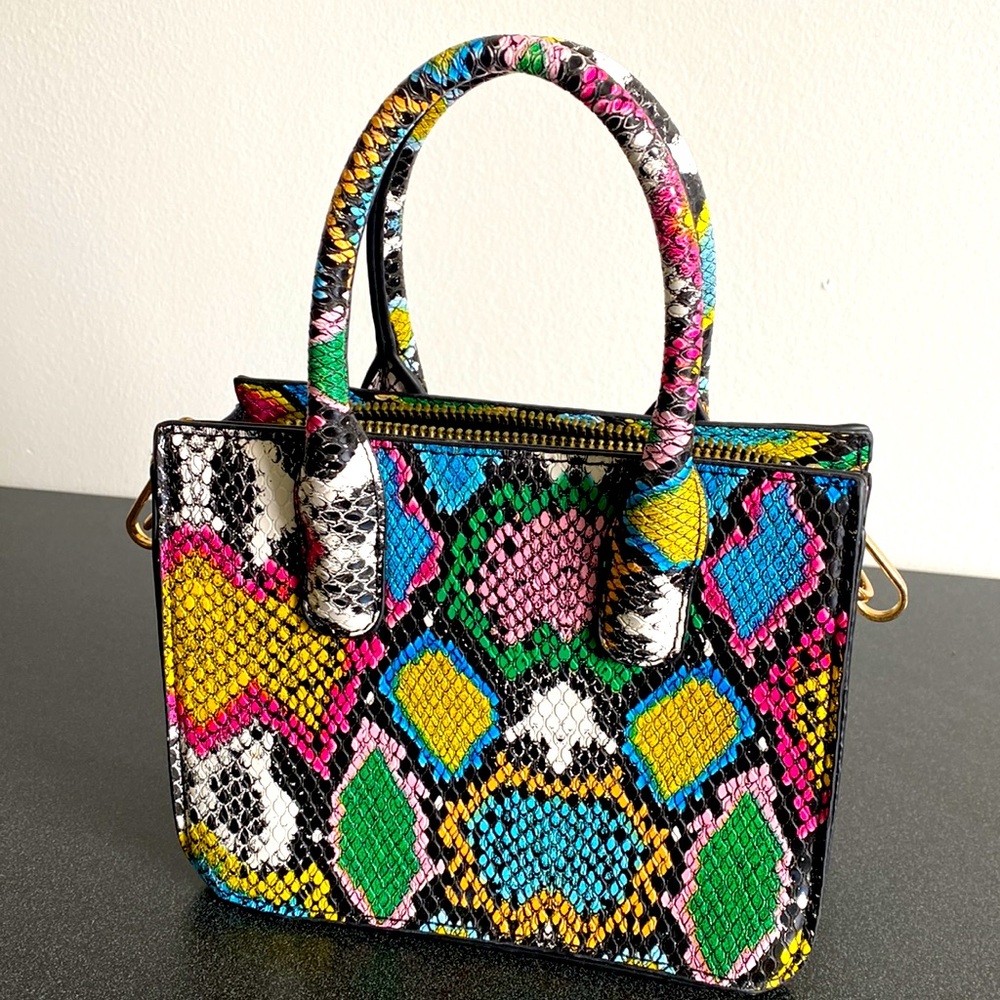 Rainbow, snake printed mini handbag with a chain to become a cross body.